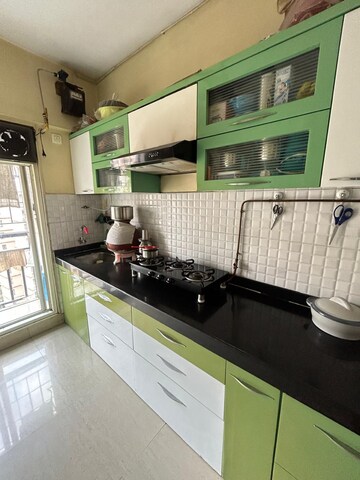 Kitchen in 1 BHK Apartment at Rosa Gardenia, Anand Nagar – for Sale