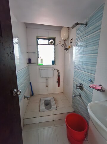 Bathroom in 2 BHK Apartment at Gala Pride Park, Manpada – for Sale