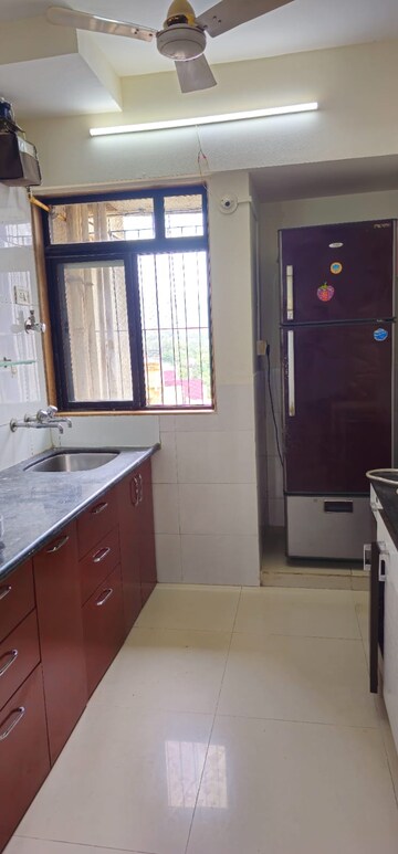 Kitchen in 2 BHK Apartment at Puranik Hometown, Ghodbunder Road – for Sale