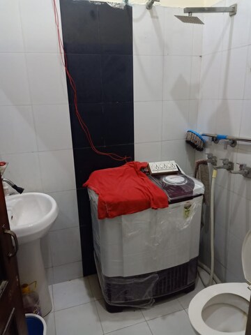 Bathroom in 2 BHK Apartment at Guru Nanak Enclave, Dhakoli Village – for Sale