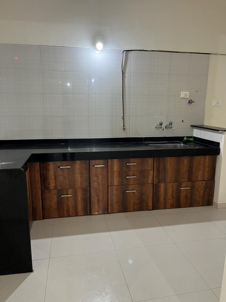 Kitchen, nyati-elan 2 Bedroom 1100 Sq.Ft. Apartment In Wagholi Pune 7469684