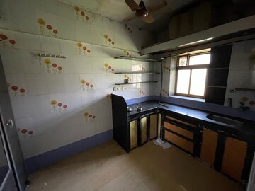 Kitchen in 1 RK Apartment at Alaknanda CHS, Dahisar East – for Sale