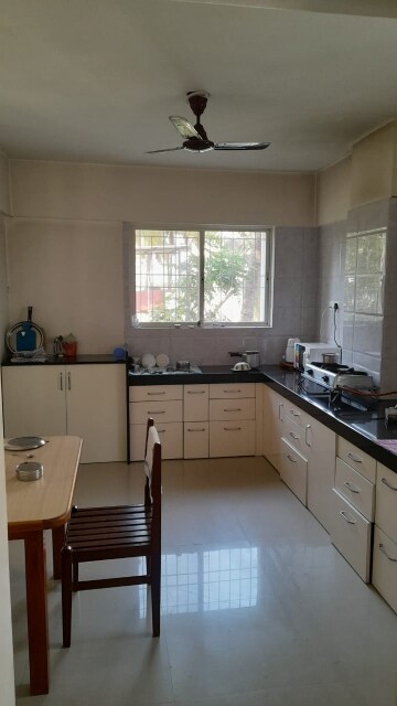 Kitchen in 6+ BHK Apartment at Karve Nagar – for Sale