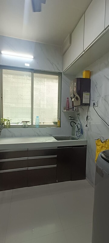 Kitchen in 2 BHK Apartment at 5P Manohar Shreeji Nirvana Phase 3, Katrap – for Sale