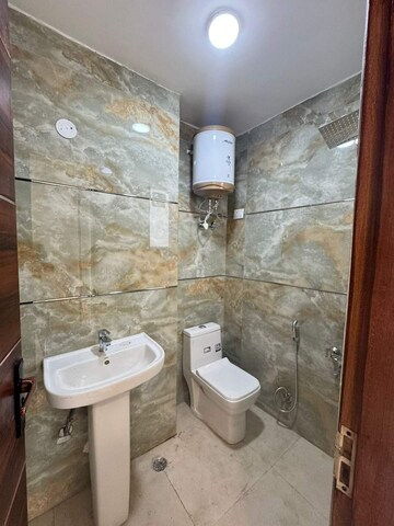 Bathroom in 3 BHK Builder Floor at Chattarpur – for Sale