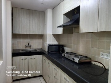 Kitchen in 3 BHK Apartment at Logix Blossom County, Sector 137 – for Sale