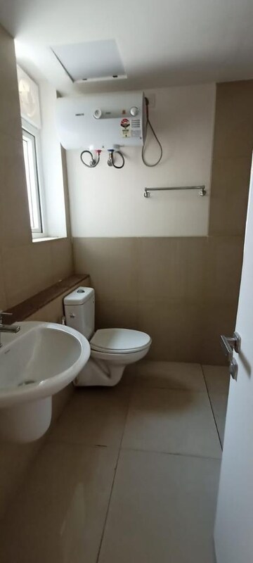 Bathroom in 2 BHK Apartment at Signature Global Orchard Avenue, Sector 93 – for Sale