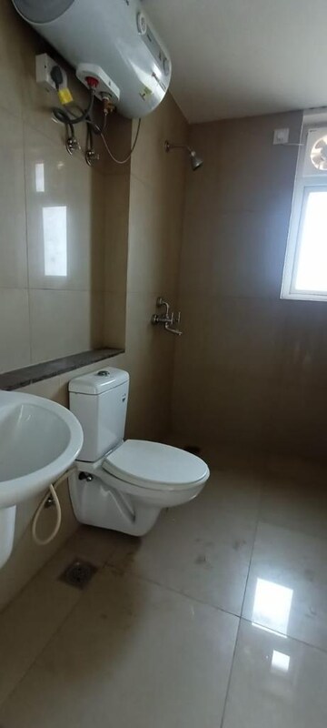 Bathroom in 2 BHK Apartment at Signature Global Orchard Avenue, Sector 93 – for Sale
