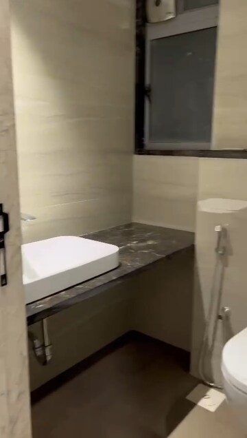 Bathroom in 2 BHK Apartment at Veena Solace, Santacruz West – for Sale