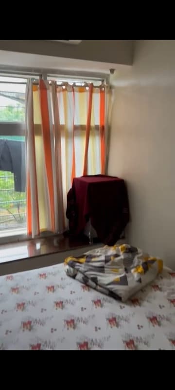 Living Room in 2 BHK Apartment at Soham Garden, Manpada – for Sale
