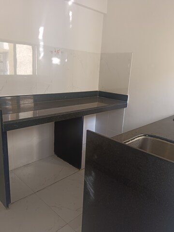 Kitchen in 1.5 BHK Apartment at Runwal Gardens, Dombivli East – for Sale