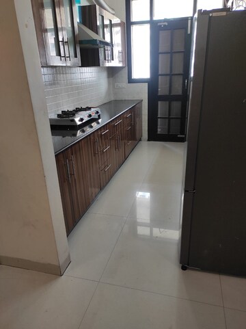 Kitchen in 3 BHK Apartment at Golden Sand Apartments, Dhakoli Village – for Sale
