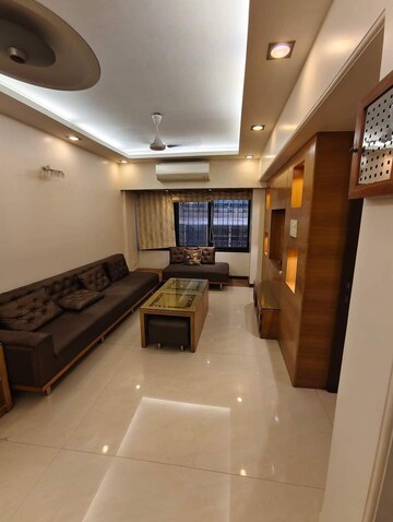 Living Room in 1 BHK Apartment at Lodha Amara, Kolshet Road – for Sale
