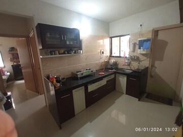 Kitchen in 2 BHK Apartment at Adajan – for Sale