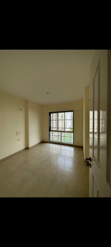 Room in 2 BHK Apartment at Divine Aspen Garden, Goregaon East – for Sale