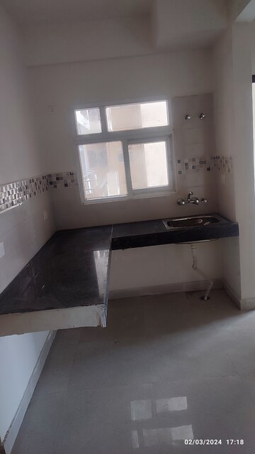Kitchen in 2 BHK Apartment at Signature Global Orchard Avenue, Sector 93 – for Sale