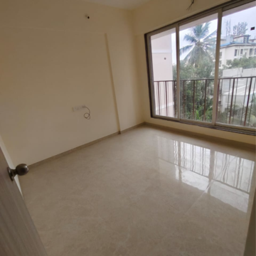 Bedroom in 2 BHK Apartment at Divine Blue Star CHS, Ic Colony – for Sale