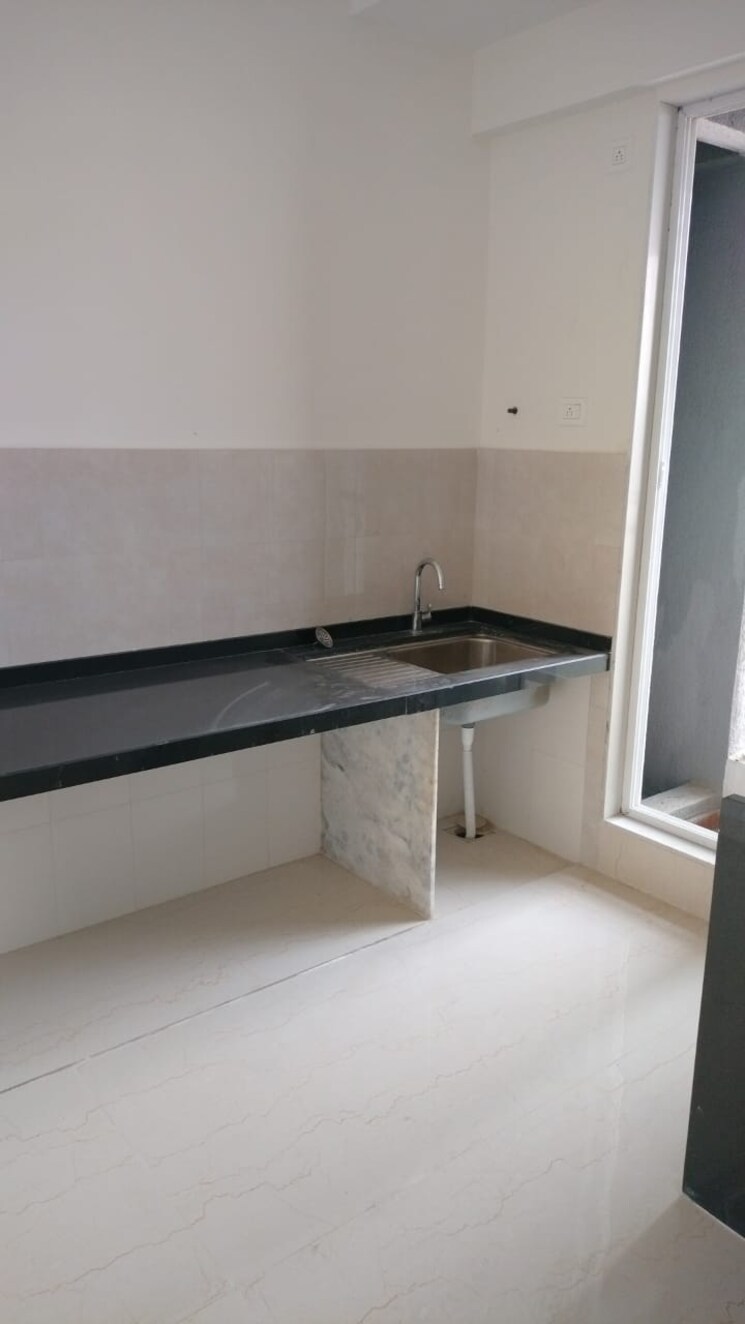 Kitchen, godrej-emerald 2 Bedroom 721 Sq.Ft. Apartment In Ghodbunder Road Thane 7479711