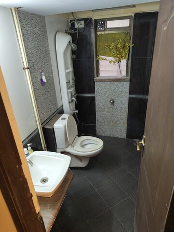 Bathroom in 2 BHK Apartment at Regency Estate, Dombivli East – for Sale
