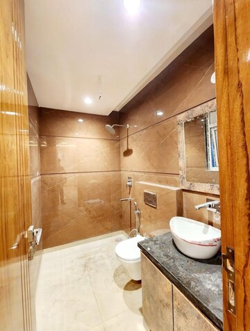Bathroom in 4 BHK Builder Floor at Chattarpur – for Sale