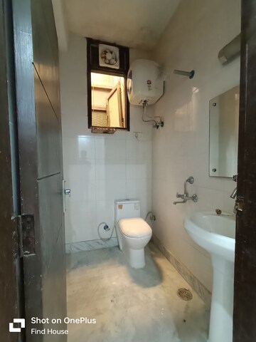 Bathroom in 3 BHK Builder Floor at Khirki Extension – for Sale