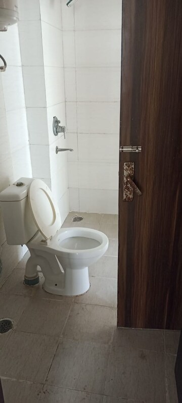 Bathroom in 2 BHK Apartment at Aditya Celebrity Homes, Sector 76 – for Sale