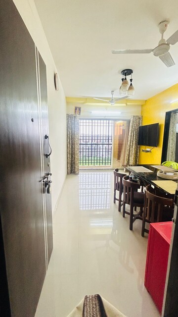 Living Room in 1 BHK Apartment at Agarwal Paramount, Virar West – for Sale