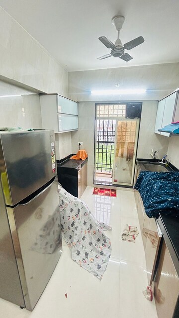 Kitchen in 1 BHK Apartment at Agarwal Paramount, Virar West – for Sale