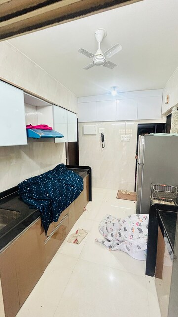 Kitchen in 1 BHK Apartment at Agarwal Paramount, Virar West – for Sale