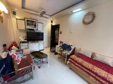 Living Room in 1 BHK Apartment at Mandakini CHS, Dahisar East – for Sale