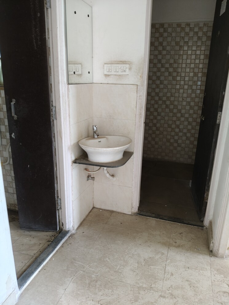 Bathroom, goel-sai-ganga 1 Bedroom 625 Sq.Ft. Apartment In Undri Pune 7484229