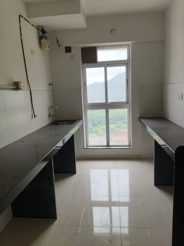 Kitchen in 2 BHK Apartment at Godrej Emerald, Ghodbunder Road – for Sale
