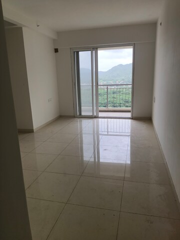 Living Room in 2 BHK Apartment at Godrej Emerald, Ghodbunder Road – for Sale