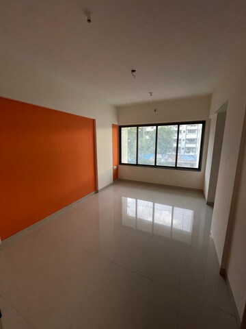 Living Room in 1 BHK Apartment at Laxmi Umesh Apartments, Dahisar East – for Sale