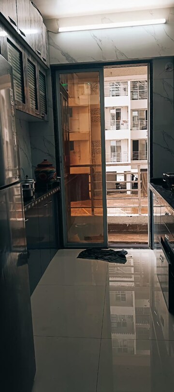 Kitchen in 3 BHK Apartment at Murbad Road – for Sale