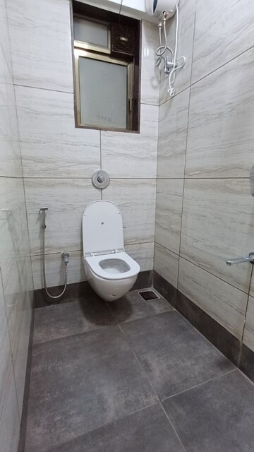 Bathroom in 2 BHK Apartment at New Ambivali, Andheri West – for Sale