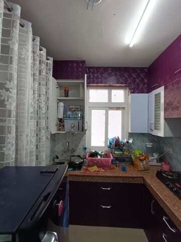 Kitchen in 3 BHK Apartment at Casa Woodstock, Sector 16c Greater Noida – for Sale