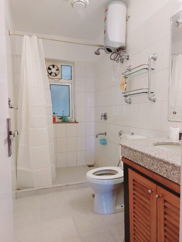 Bathroom in 3 BHK Apartment at Vatika City, Sector 49 – for Sale