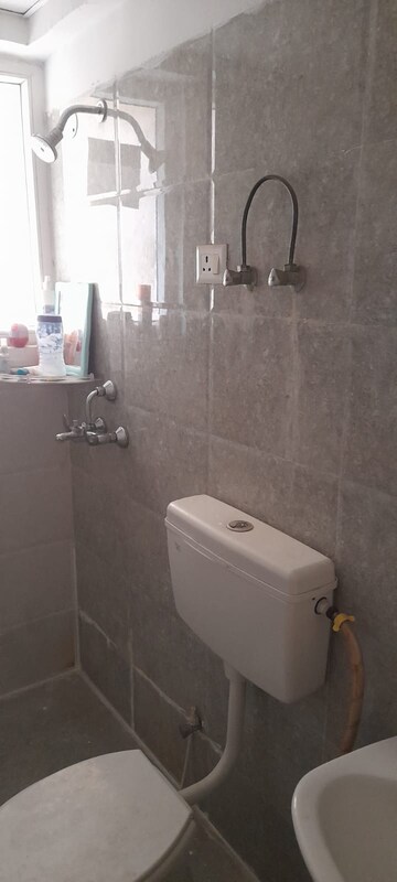 Bathroom in 2 BHK Apartment at Panchsheel Wellington, Sain Vihar – for Sale