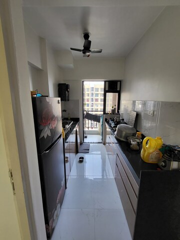 Kitchen in 1.5 BHK Apartment at Runwal Gardens, Dombivli East – for Sale