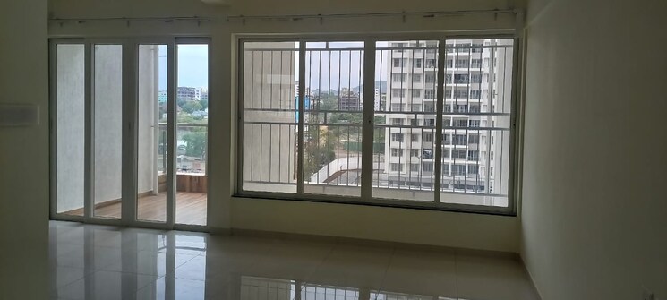 Living Room, kolte-patil-life-republic-sec-r7-7th-avenue-i 3 Bedroom 768 Sq.Ft. Apartment In Hinjewadi Pune 7487862