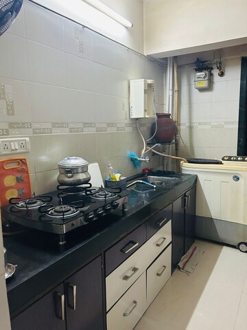 Kitchen in 2 BHK Apartment at Gala Pride Park, Manpada – for Sale