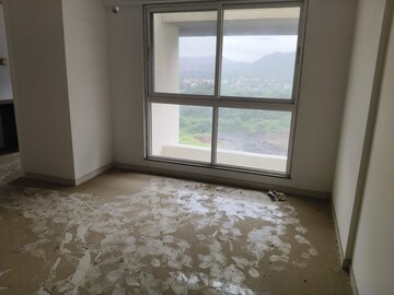 Living Room in 1.5 BHK Apartment at Godrej Emerald, Ghodbunder Road – for Sale