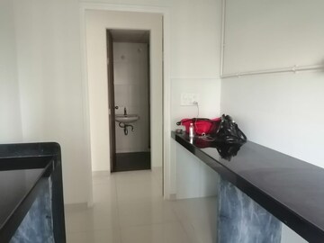 Kitchen in 2 BHK Apartment at Godrej Emerald, Ghodbunder Road – for Sale