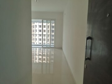 Living Room in 2 BHK Apartment at Godrej Emerald, Ghodbunder Road – for Sale