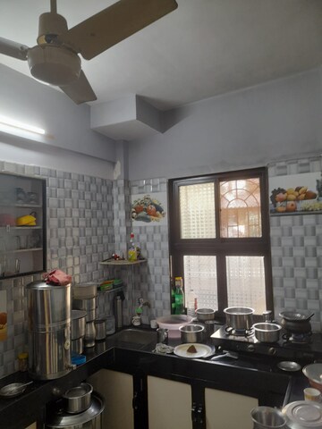 Kitchen in 2 BHK Apartment at Serenity Gardens, Vasai East – for Sale