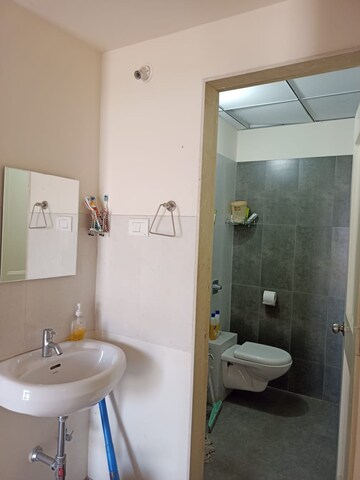 Bathroom in 2.5 BHK Apartment at Rosa Gardenia, Ghodbunder Road – for Sale