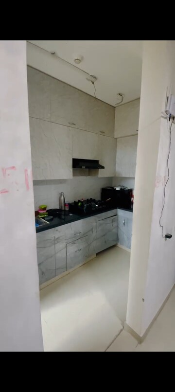 Kitchen in 2 BHK Apartment at Windsor Paradise 2, Raj Nagar Extension – for Sale