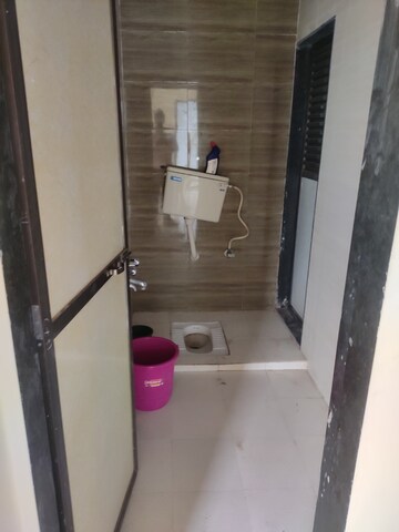 Bathroom in 2 BHK Apartment at Mahad – for Sale