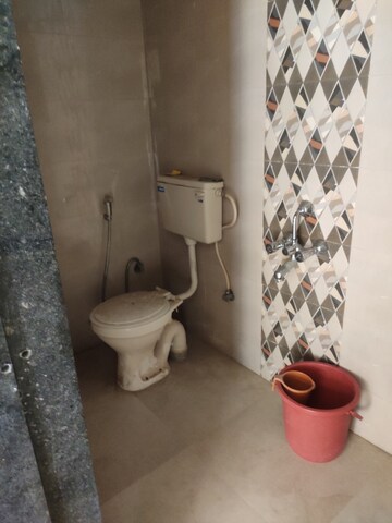 Bathroom in 2 BHK Apartment at Mahad – for Sale